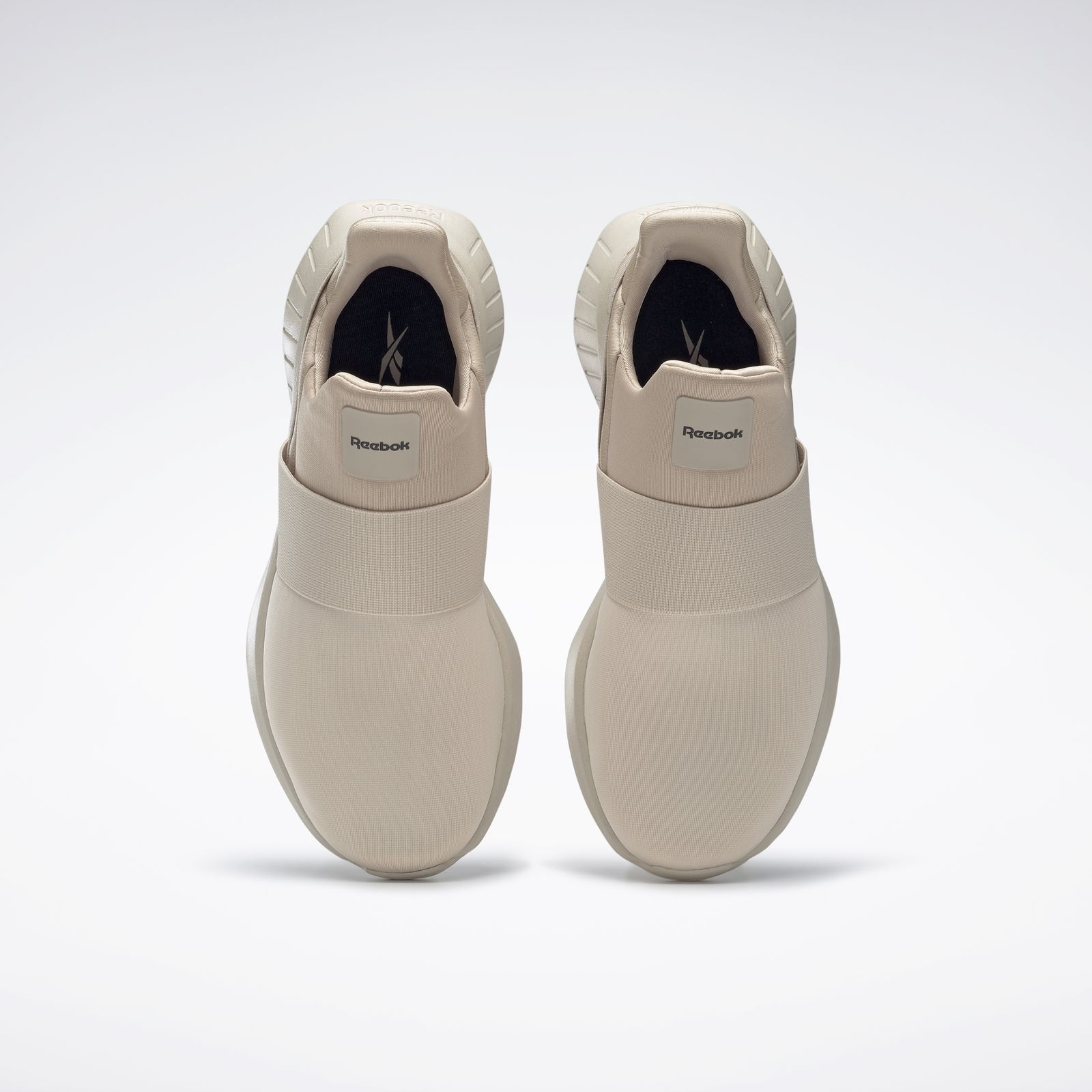 Reebok lite best sale slip on beige