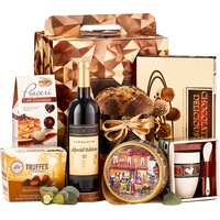 pachet cadou best image model good taste cu vin rosupanettone bomboane praline si multe delicii imagen 8_0_
0