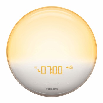 Radio FM cu ceas Philips HF3531/01, LED, Wake-up light, Midnight light, Sunrise Simulation, SmartSnooze, 20 setari luminozitate, 7 sunete naturale de alarma, alb/galben Radio FM cu ceas Philips HF3531/01, LED, Wake-up light, Midnight light, Sunrise Simulation, SmartSnooze, 20 setari luminozitate, 7 sunete naturale de alarma, alb/galben