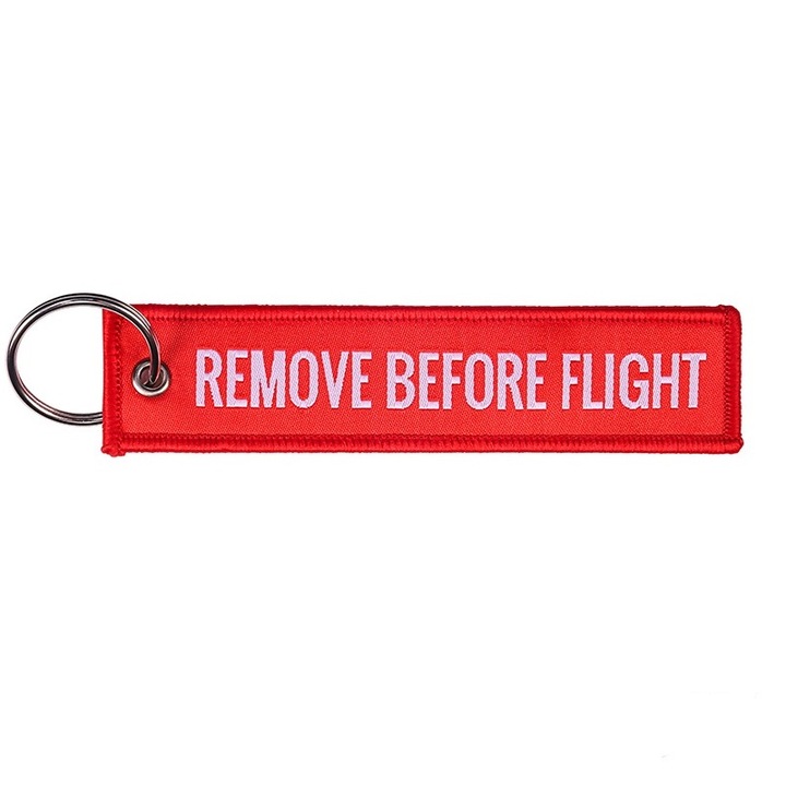 Breloc Auto Moto Textil Rosu Remove Before Flight 13cm