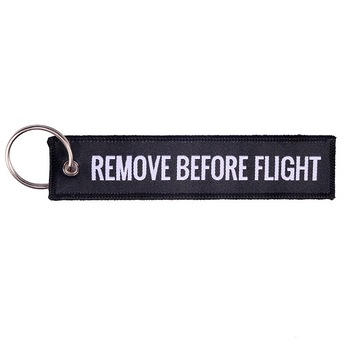 Breloc Auto Moto Textil Negru Remove Before Flight 13cm Breloc Auto Moto Textil Negru Remove Before Flight 13cm