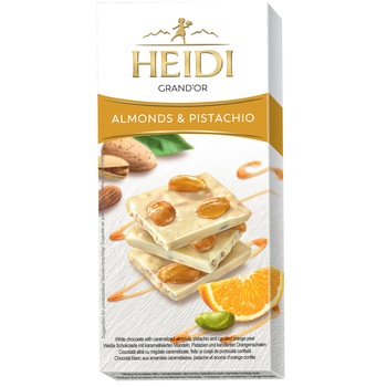 Ciocolata alba Heidi Grand'Or cu migdale caramelizate, fistic si portocala 100 gr.
