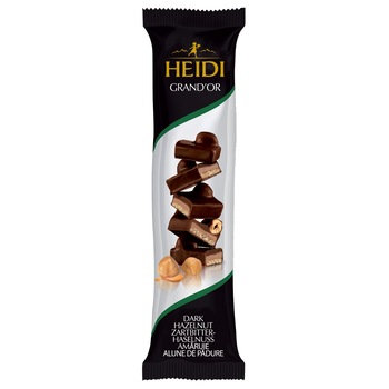 Baton ciocolata Heidi Grand'Or amaruie cu alune de padure 42 gr. Baton ciocolata Heidi Grand'Or amaruie cu alune de padure 42 gr.