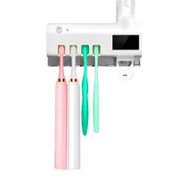 dozator pasta de dinti functie de sterilizare antibacteriala periute cu lumina uv  suport periute dinti alb imagen 28_0_
0