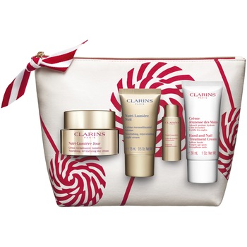 Set Clarins: Crema de zi, 50 ml + Crema de noapte, 50 ml + Lotiune, 10 ml + Tratament pentru maini&unghii, 30 ml Set Clarins: Crema de zi, 50 ml + Crema de noapte, 50 ml + Lotiune, 10 ml + Tratament pentru maini&unghii, 30 ml