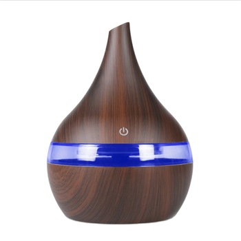 Difuzor Aromaterapie cu Ulei - Umidificator , 7 Culori LED , 300 ml , Cablu USB , Lemn Inchis Difuzor Aromaterapie cu Ulei - Umidificator , 7 Culori LED , 300 ml , Cablu USB , Lemn Inchis