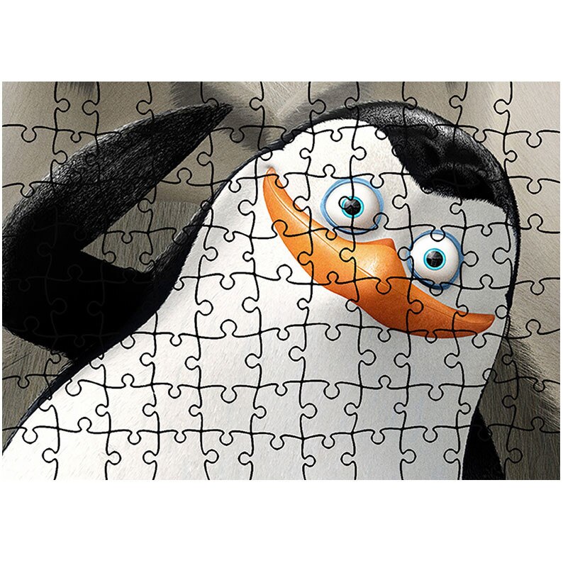 Puzzle Heartwork 96 piese, Pingiunii Madagascar, animatii, Latime 40,5 cm x Inaltime 28,7 cm