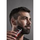 Aparat de tuns parul Rowenta Advancer TN5221F4, autonomie 120min, functie incarcare rapida, 3 piepteni, 45 de lungimi de taiere, lame cu tehnologie de auto-ascutire, negru/rosu