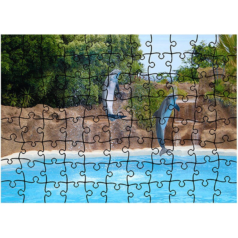 Puzzle Heartwork 96 piese, Cativa delfini jucausi, Latime 40,5 cm x Inaltime 28,5 cm