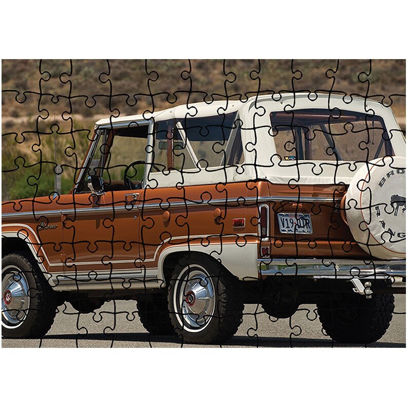 Puzzle Heartwork 96 piese, Ford Bronco 1966-77, Latime 40,5 cm x Inaltime 28,5 cm