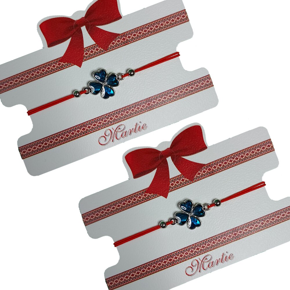 Set 2 Bratari Martisor ArtDeco Trifoi sidef, realizate din aliaj metalic argintiu placat cu sidef si elastic rosu, reglabile pe noduri 8 - 25 cm