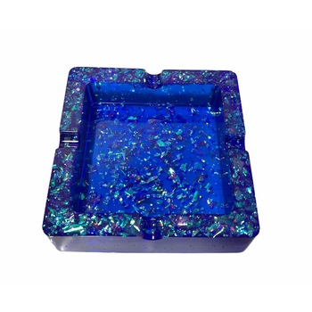 Scrumiera Gentelo din rasina epoxidica albastru cu insertii, 9 cm X 9 cm Scrumiera Gentelo din rasina epoxidica albastru cu insertii, 9 cm X 9 cm