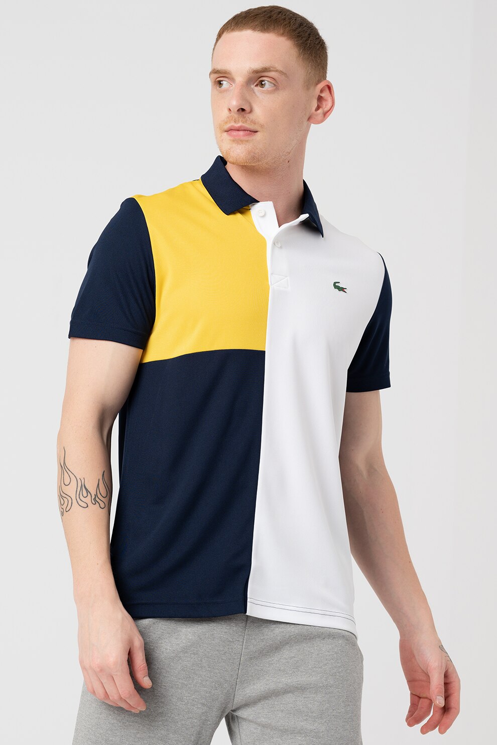 Lacoste Tricou polo cu model colorblock si logo bleumarin galban