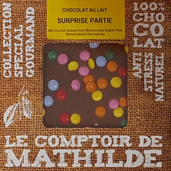 Tableta de ciocolata Comptoir de Mathilde cu lapte si drajeuri Tableta de ciocolata Comptoir de Mathilde cu lapte si drajeuri