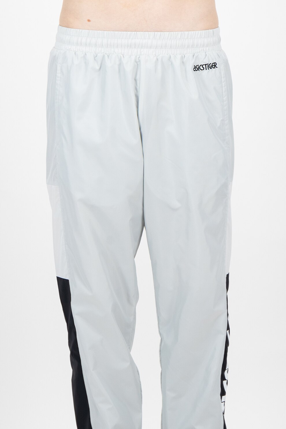 celana training asics