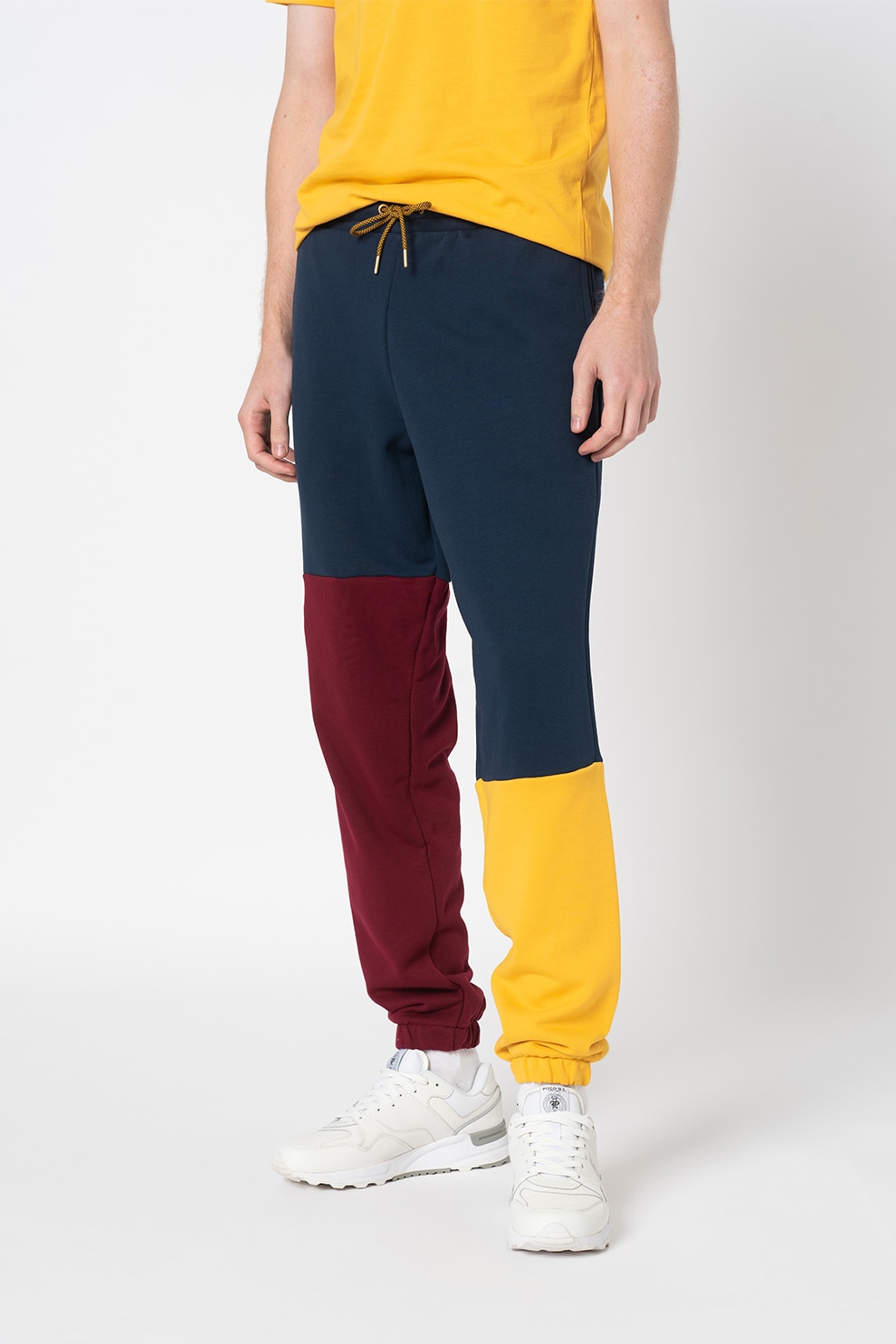 New Balance, Pantaloni sport Athletics Higher Learning, bleumarin, galben sofran, violet tyrian