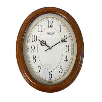 Ceas de perete RIKON 8651 oval Maro deschis Ceas de perete RIKON 8651 oval Maro deschis