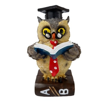 Statueta din rasina reprezentand o bufnita cu o carte, 13 cm Statueta din rasina reprezentand o bufnita cu o carte, 13 cm