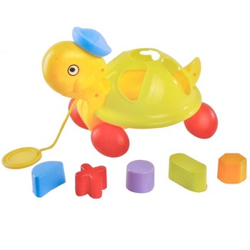 Jucarie interactiva pentru bebelusi, Zola®, ratusca galbena cu corpuri geometrice Jucarie interactiva pentru bebelusi, Zola®, ratusca galbena cu corpuri geometrice