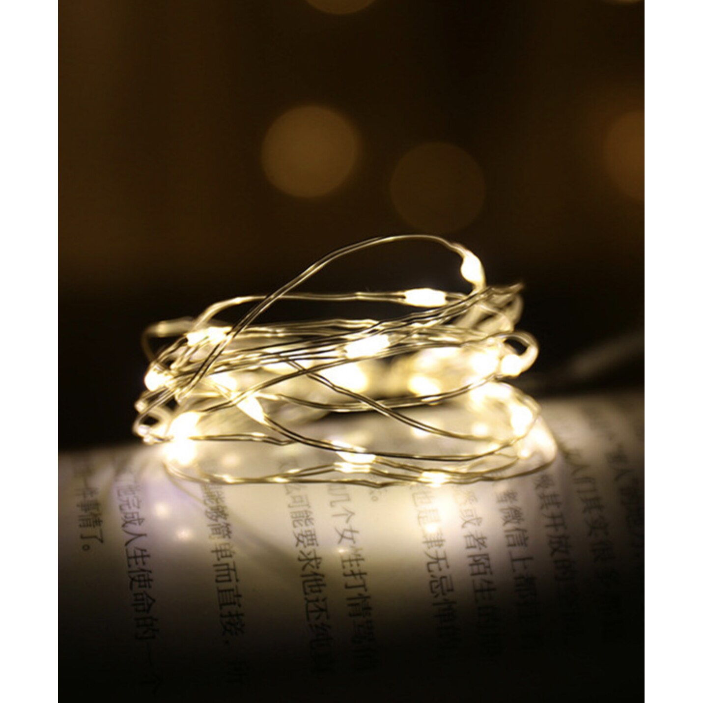 Instalatie luminoasa LED de Craciun, 10 led-uri, 1m, culoare alb cald, alimentare cu 2 baterii CR 2032