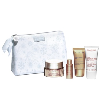 Set de ingrijire pentru ten, Clarins Nutri-Lumiere, crema de zi 50 ml, crema de noapte 15 ml, lotiune 10 ml, crema de maini 30 ml, portfard Set de ingrijire pentru ten, Clarins Nutri-Lumiere, crema de zi 50 ml, crema de noapte 15 ml, lotiune 10 ml, crema de maini 30 ml, portfard