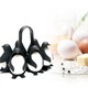 Suport pentru fiert si servit oua, Quasar & Co.®, 6 spatii, forma pinguin, plastic termorezistent, negru