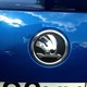 Emblema Skoda, montare pe capota sau portbagaj, 89mm, negru/argintiu