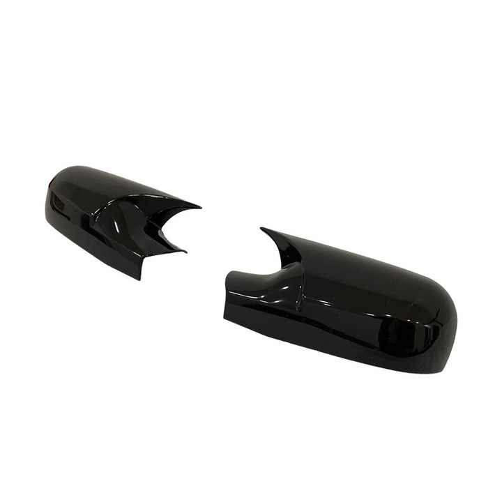 Set 2 capace oglinda model JOKER tunning dedicate Renault Scenic an 2005-2009, fabricate din ABS culoare negru lucios din turnare, montaj prin lipire peste capacul existent