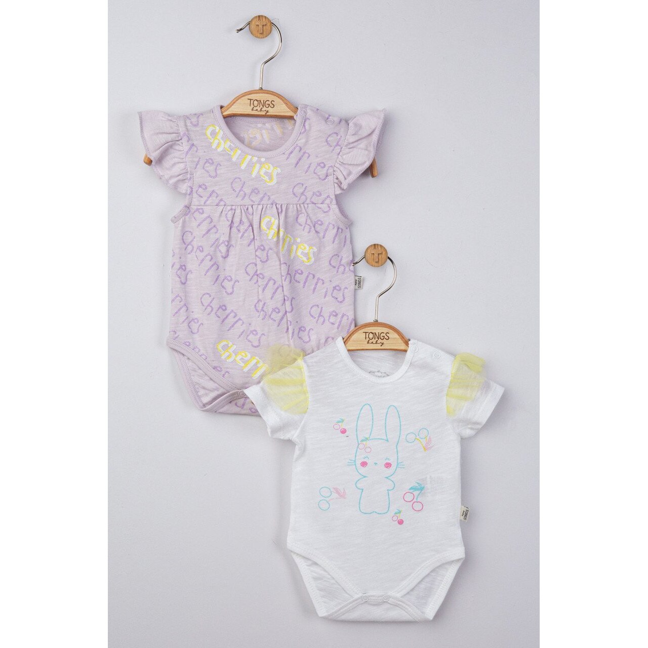 Комплект от 2 бодита с волани бяло и лилаво Tongs baby 03 месеца eMAG.bg