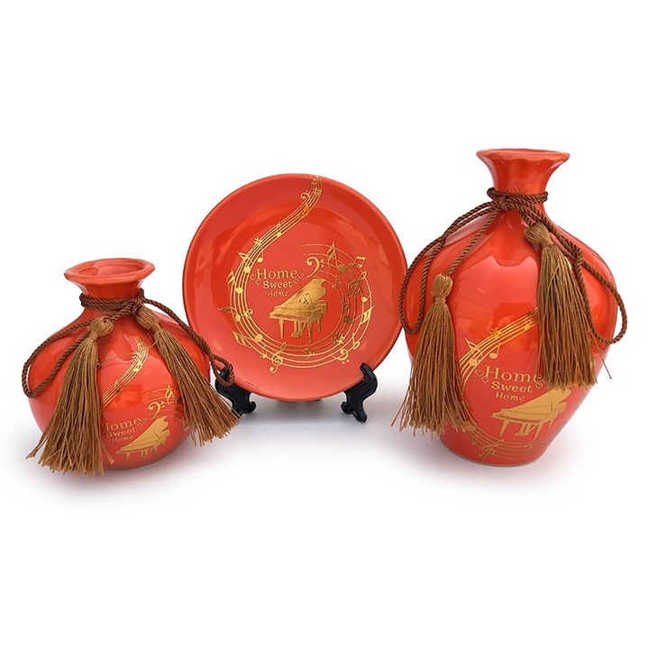 Set din ceramica format din doua vaze si o farfurie cu note muzicale si snur, rosu, 32x17 cm