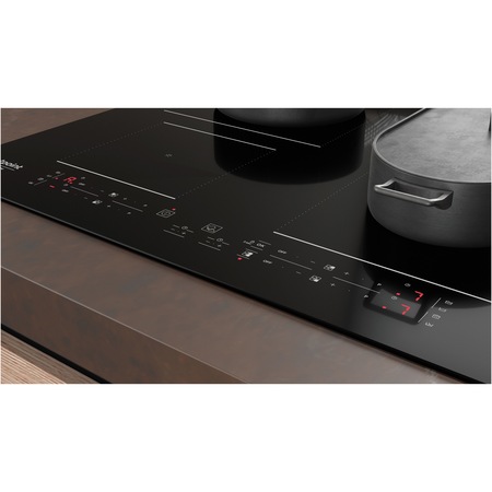 Plita incorporabila Hotpoint HB4860BNE, Inductie, 4 zone de gatire, 4 zone booster, Timer, Blocare acces copii, Power Management, Indicator incalzire reziduala, 60 cm, Negru