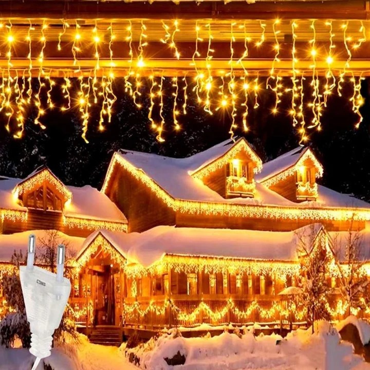 Instalatie de Craciun tip Perdea Interior / Exterior, IP44, 10 m x 1 m, 600 Led-uri, Alb Cald, 8 jocuri de lumini cu telecomanda, Interconectabila, Cablu transparent, Prelungitor de 3 m inclus