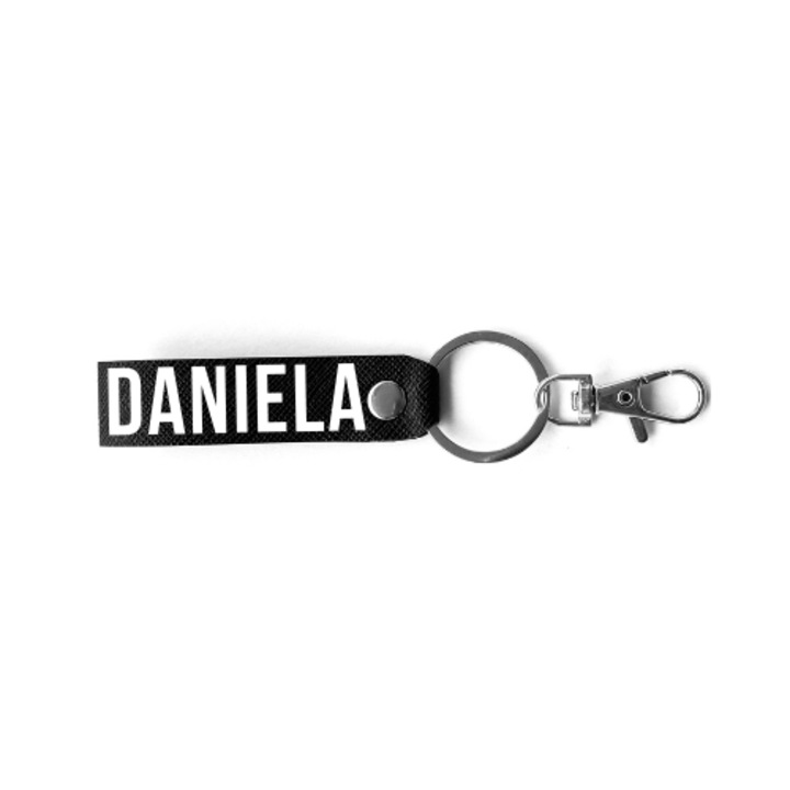 Breloc personalizat femei, BRELOCK, piele, 3 x 8 cm, print text cu nume "Daniela", negru argintiu