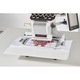 Masina de brodat computerizata Brother PR1050X, aria de brodare 36x20, 699 modele de broderie, 37 fonturi, 10 ace, 10 culori, brodeaza produs finit cu brat liber, ghidaj laser, ecran color 10", USB, 1000 imp/min, alb