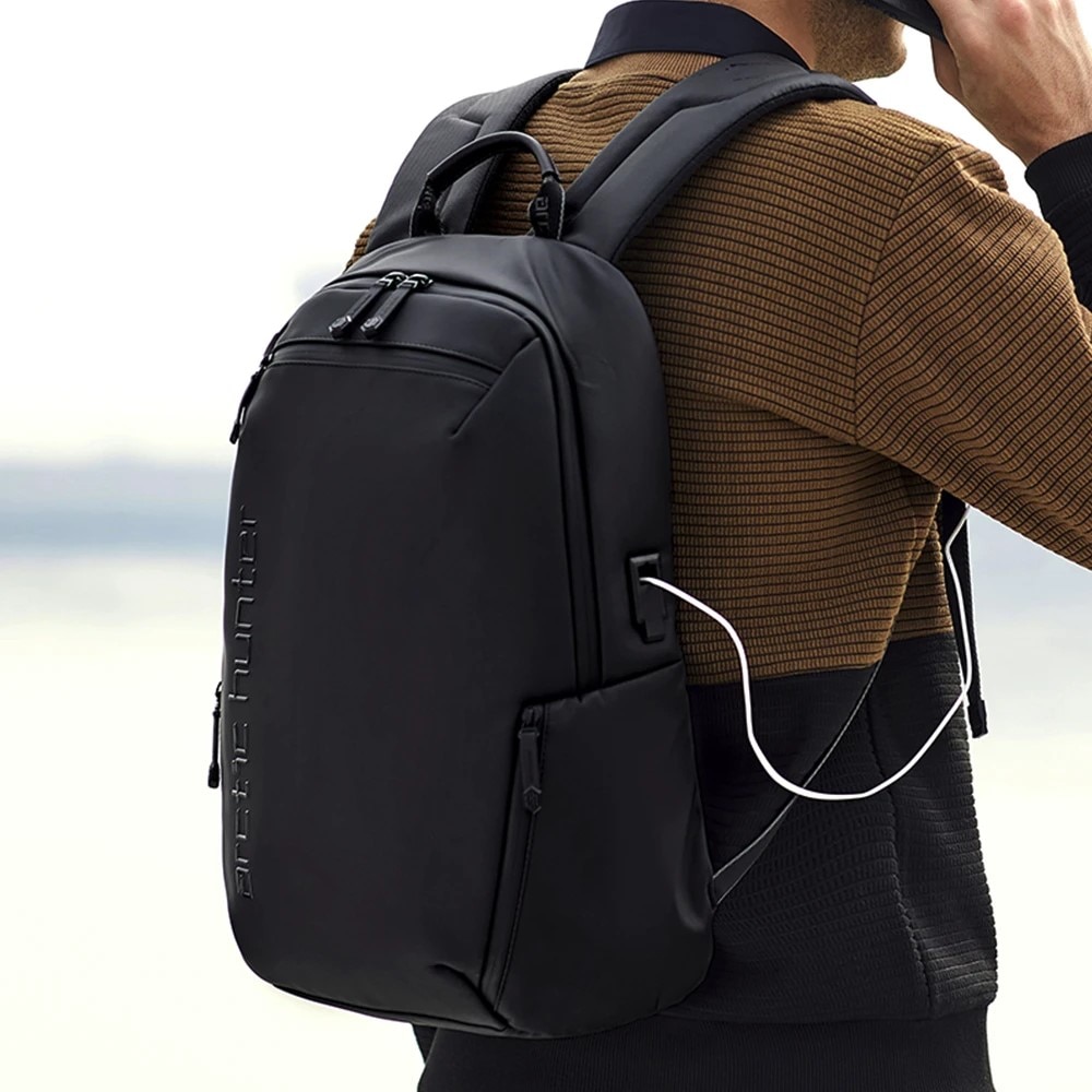Rucsac laptop 15.6", smart casual, impermeabil, cu orificiu pentru casti, Arctic Hunter, 46x30x15 cm, Negru