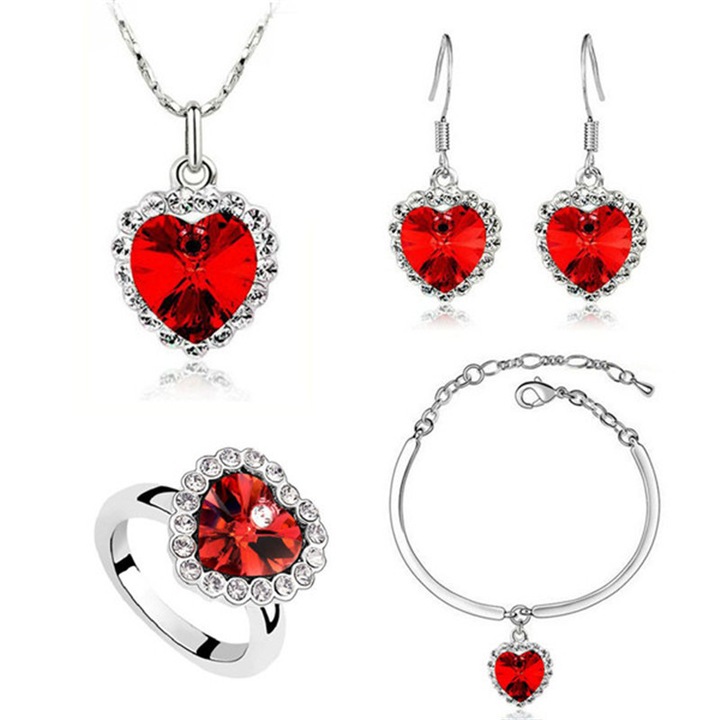 Set bijuterii dama, lantisor cu pandantiv, bratara, inel si cercei, in model forma de inima, cristale zirconiu cu efect de cristal Sapphire, placat cu aur alb 18K, Tessero, rosu