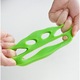 Set 2 dispozitive ElastiX pentru colectarea parului de animale, pentru masina de spalat, reutilizabile, portocaliu/verde, 8 cm