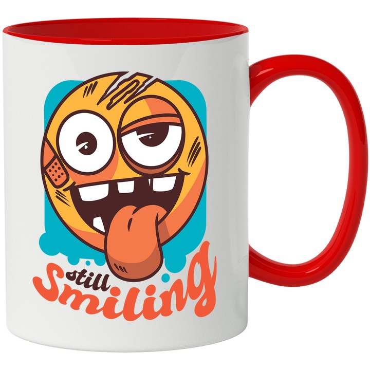 Cana Cu Emoticon Ranit Cu Limba Scaoasa, Text In Engleza Still Smiling, Funny, Multicolor 330 ml, cu maner Rosu