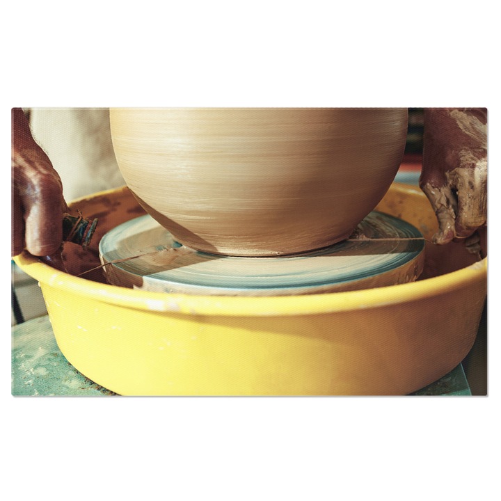 Tablou Canvas - Maiestrie in ceramica: artist si roata olarului 40x25CM