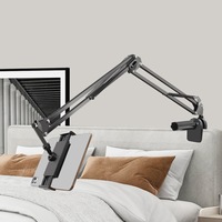 Suport de telefon si tableta pliabil, NUODWELL, Rotire la 360 de grade, Compatibil cu dispozitive intre 4.7-12,9", Pentru pat, dulap, masa, biblioteca, Metal/ABS, Negru