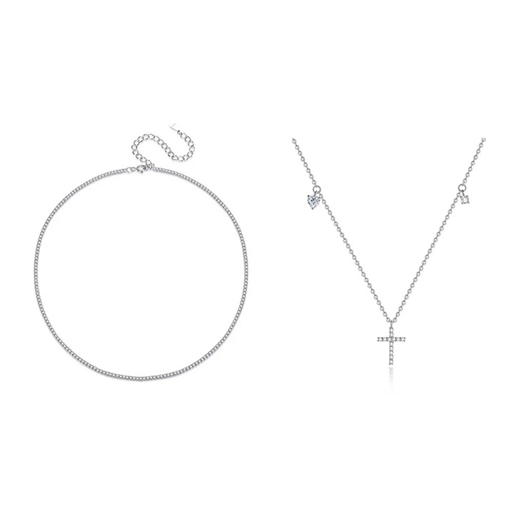 A készlet egy strassz nyakláncból és egy nyakláncból áll, központi kereszt medállal és charmmal, 925-ös ezüstözött 18K ródiummal, kiváló minőségű cirkon kövekkel