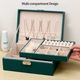 NUODWELL Кутия за бижута на 2 нива с ключ, дизайн с много отделения, водо- и влагоустойчива, за пръстени, колиета, обеци и обеци, изработена от дърво и кожа, 23 x 17,5 x 9 см, тъмнозелена