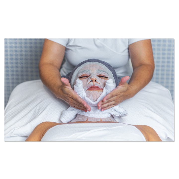 Tablou Canvas Estetician cu Prosop la Femeii estetician, prosop, fata, ingrijire piele, frumusete 100x70CM