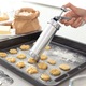 Aparat pentru facut biscuiti si fursecuri, cu 20 de discuri de modelare si 4 duze, argintiu, 14 x 21 cm