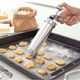 Aparat pentru facut biscuiti si fursecuri, cu 20 de discuri de modelare si 4 duze, argintiu, 14 x 21 cm