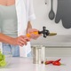 Deschizator de conserve manual Deiss PRO, din otel inoxidabil, cu maner portocaliu confortabil