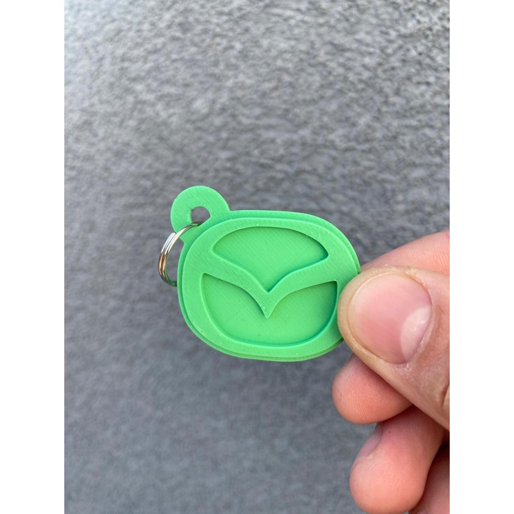 Breloc chei, "MAZDA", 36X 41 mm verde