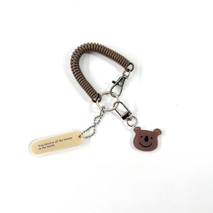 Hátizsák kulcstartó, fejhallgató védőtok, elvesztésgátló lánc, barna