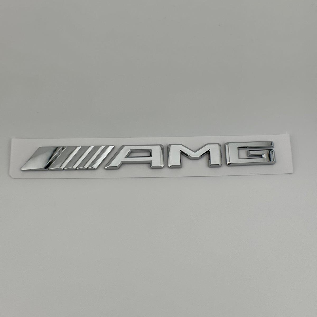 Logo Mercedes AMG Chromé Original - Compatible W205, A180, W124