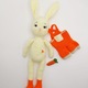 Iepuras alb cu salopeta rosie detasabila, jucarie cu sunete, crosetata